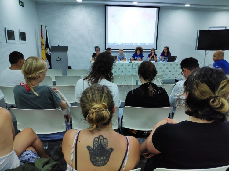 acto-refugiados-biblioteca