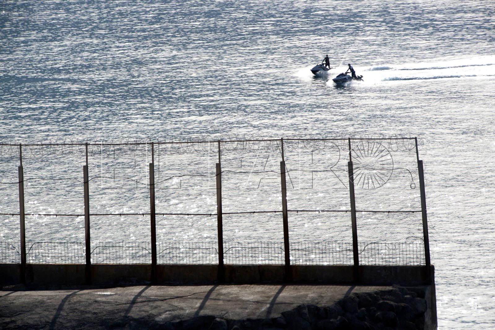 pase-inmigrantes-moto-agua