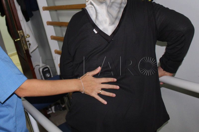 dolores-espalda-mujer-rehabilitacion