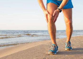 Man having a pain in his knee