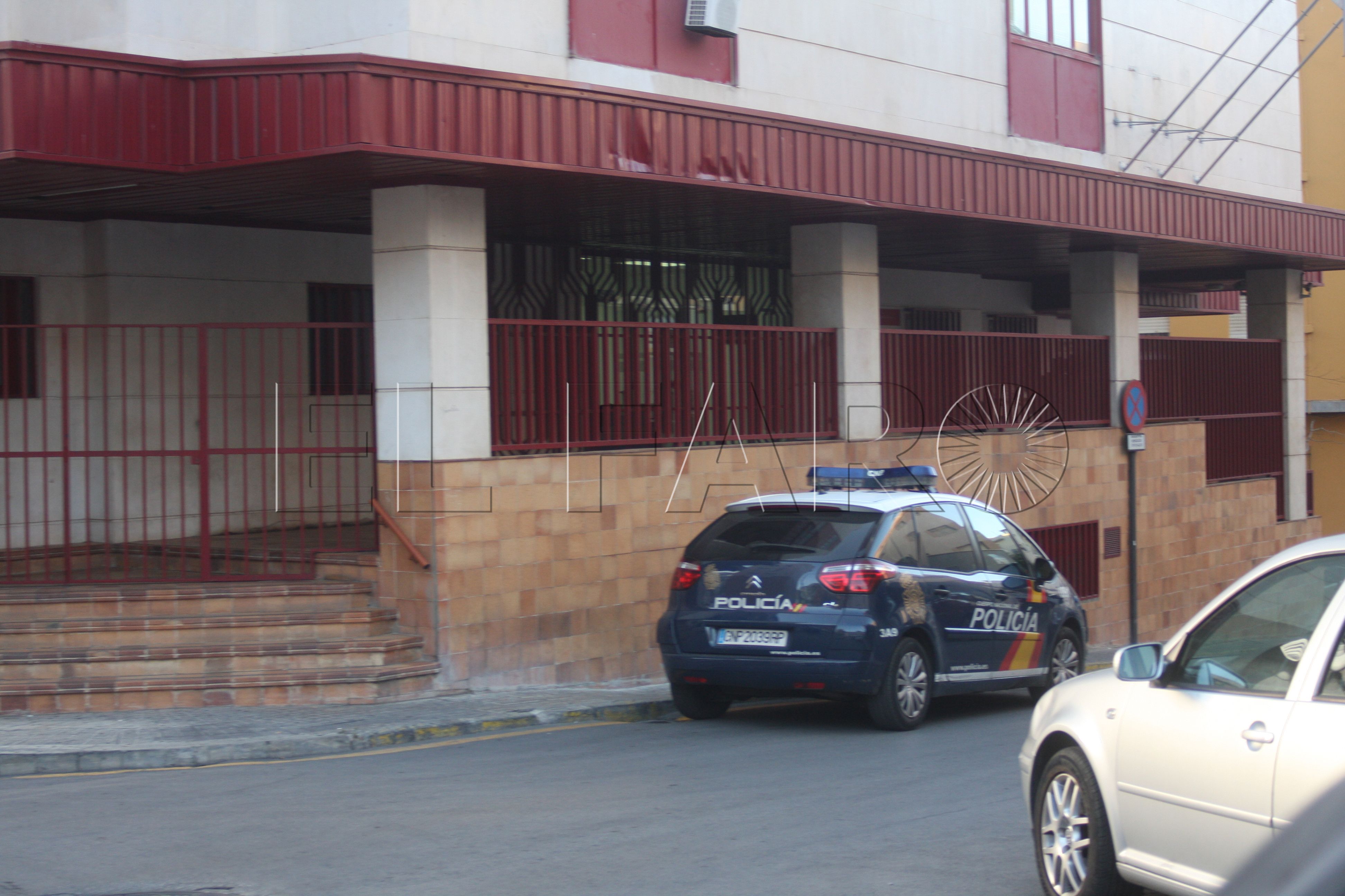 palacio-justicia-juzgados-coche-policia-nacional